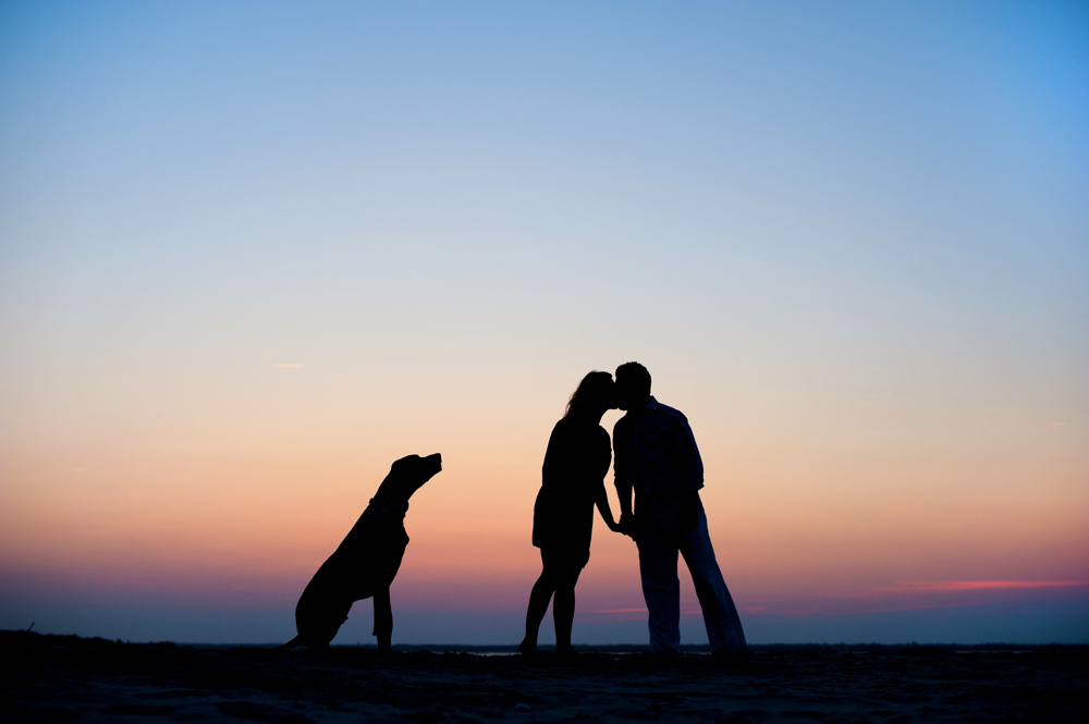 sunset couple dog