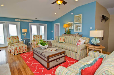 Staging all parts of your home, like the living room for sale is key.