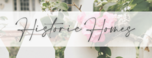 Historic Homes banner image with roses and a picket fence behind the text