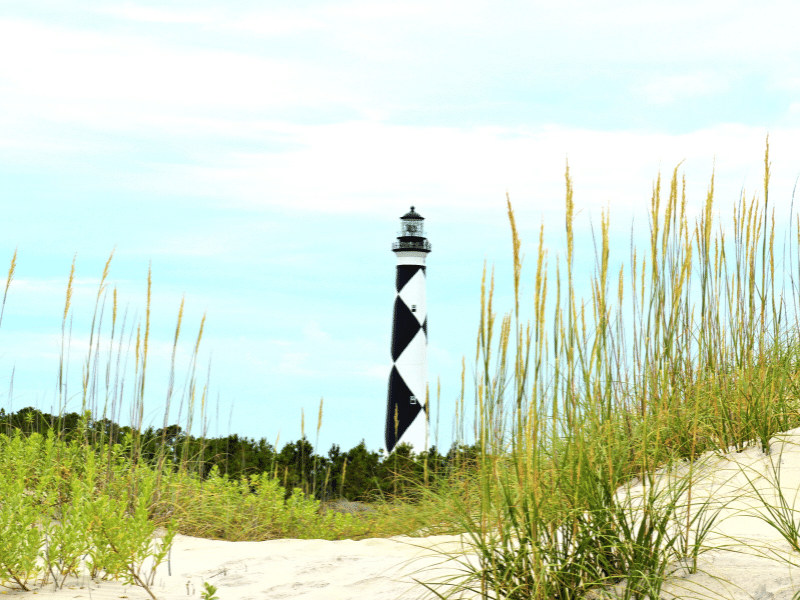 the cape lookout lighthouse in the background