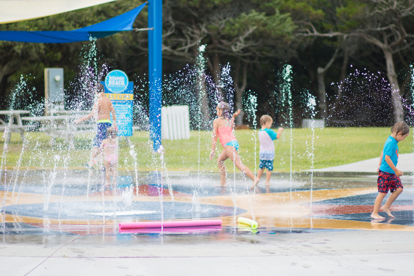Kids playing in the Atlantic Beach Town Park Splash Pad